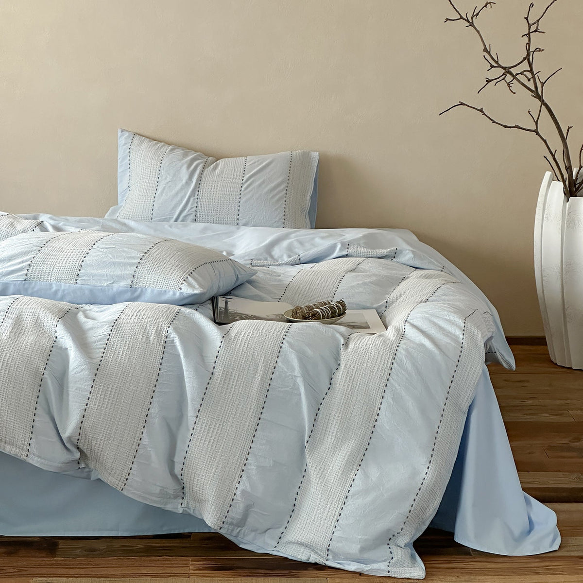 Solmere Striped Waffle-Weave Cotton Bedding Set – sky blue stripe front view of the striped bedding and pillows - Roomden