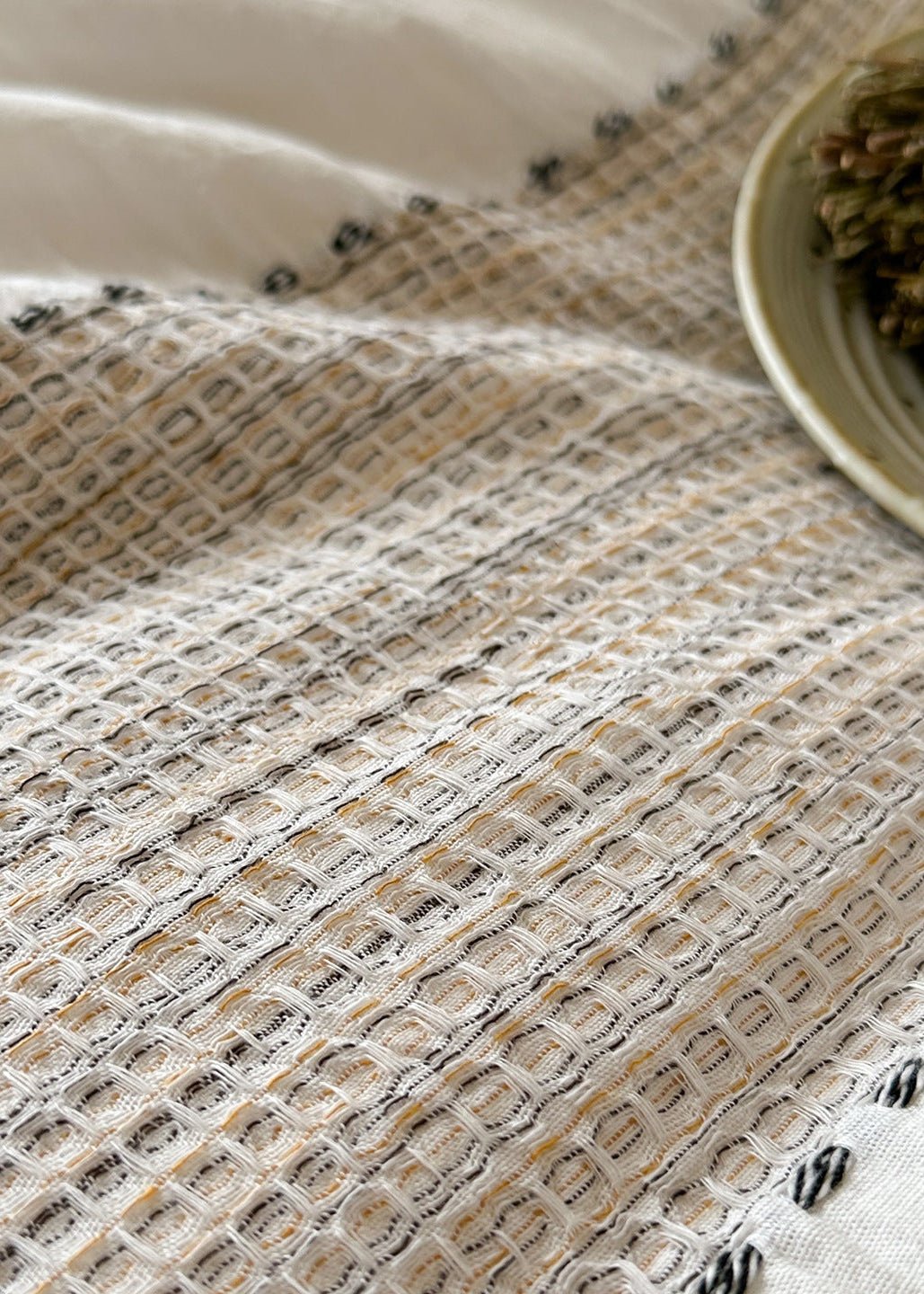 Solmere Striped Waffle-Weave Cotton Bedding Set – ivory stripe close-up of the waffle weave cotton texture - Roomden
