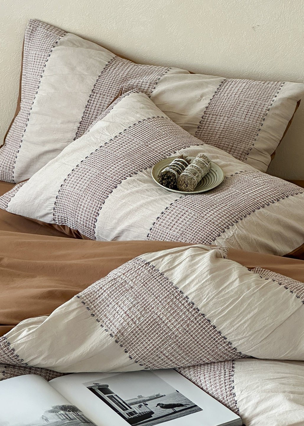 Solmere Striped Waffle-Weave Cotton Bedding Set – khaki stripe striped pillow resting on the textured duvet - Roomden