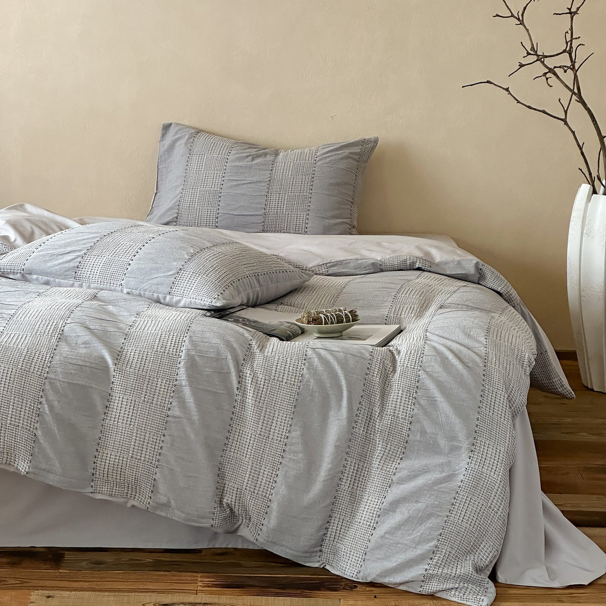 Solmere Striped Waffle-Weave Cotton Bedding Set – fog grey stripe front view of the striped bedding and pillows - Roomden