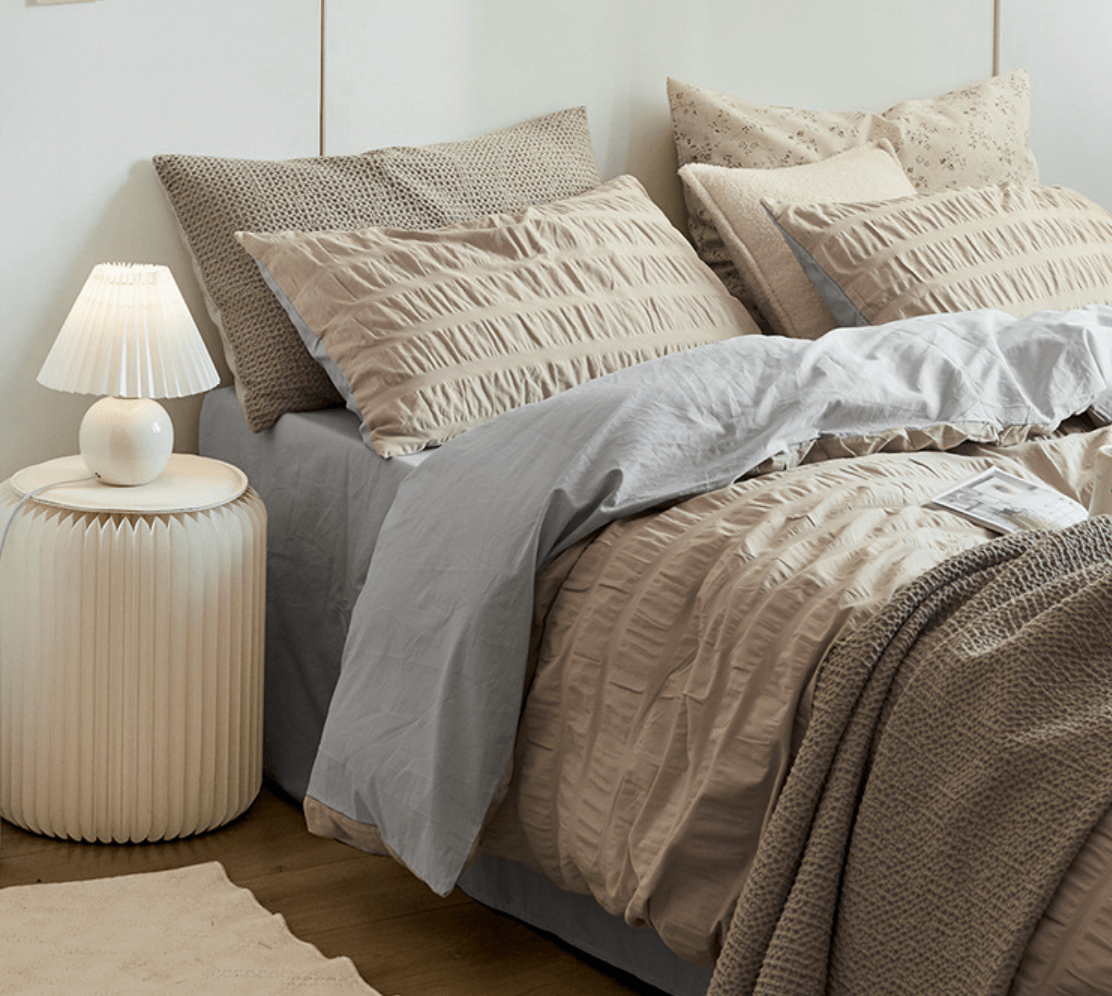 Marlon Seersucker Cotton Bedding Set – khaki textured pillows above the folded duvet - Roomden