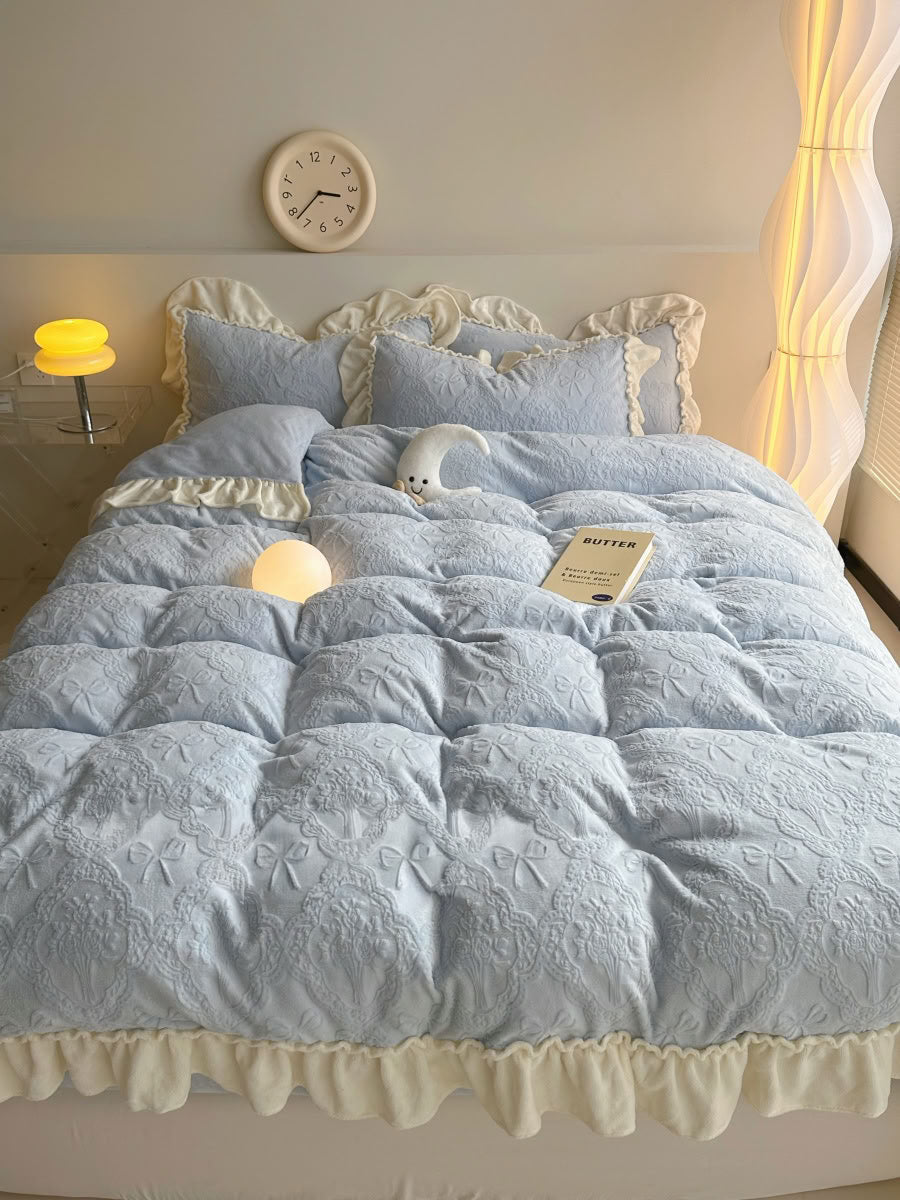 Romantic light blue flannel bedding with cream ruffled pillowcases and soft lighting - RoomDen