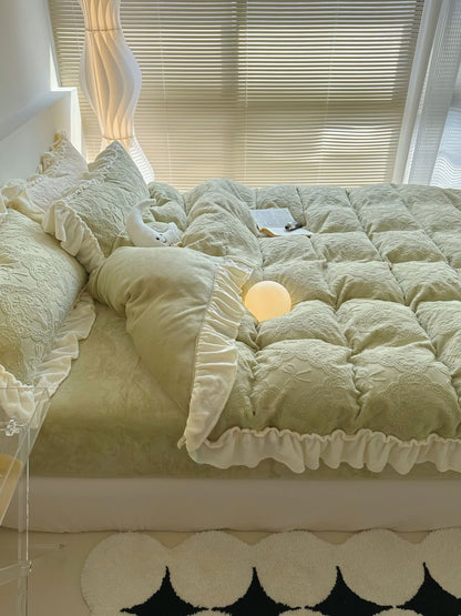 Elegant light green bedding set with embossed floral details and soft sunlight - RoomDen