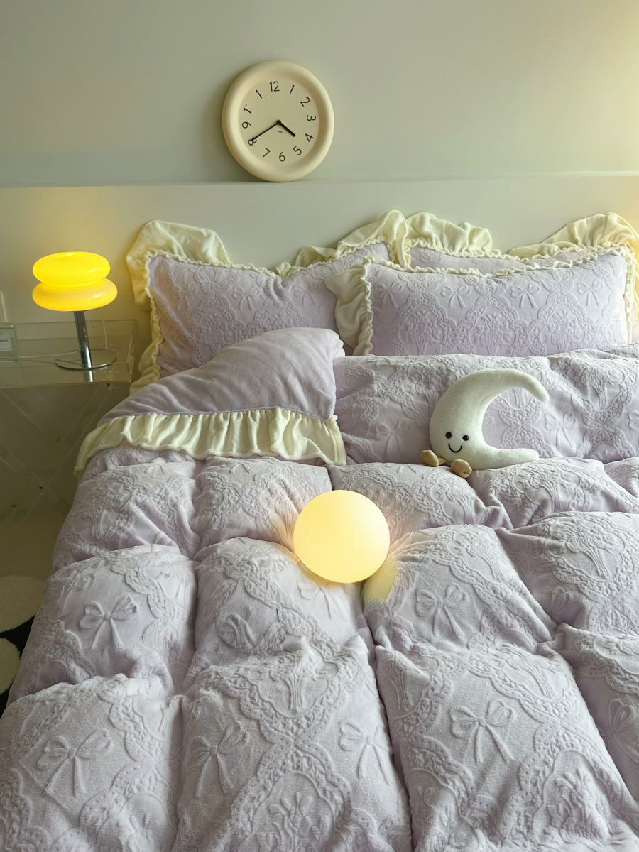 Romantic light purple flannel bedding with cream ruffled pillowcases and warm lighting - RoomDen