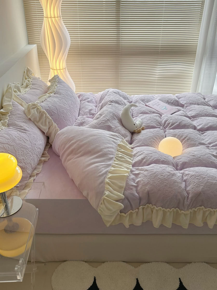 Side view of lavender fleece bedding with layered cream ruffles and moon plush - RoomDen