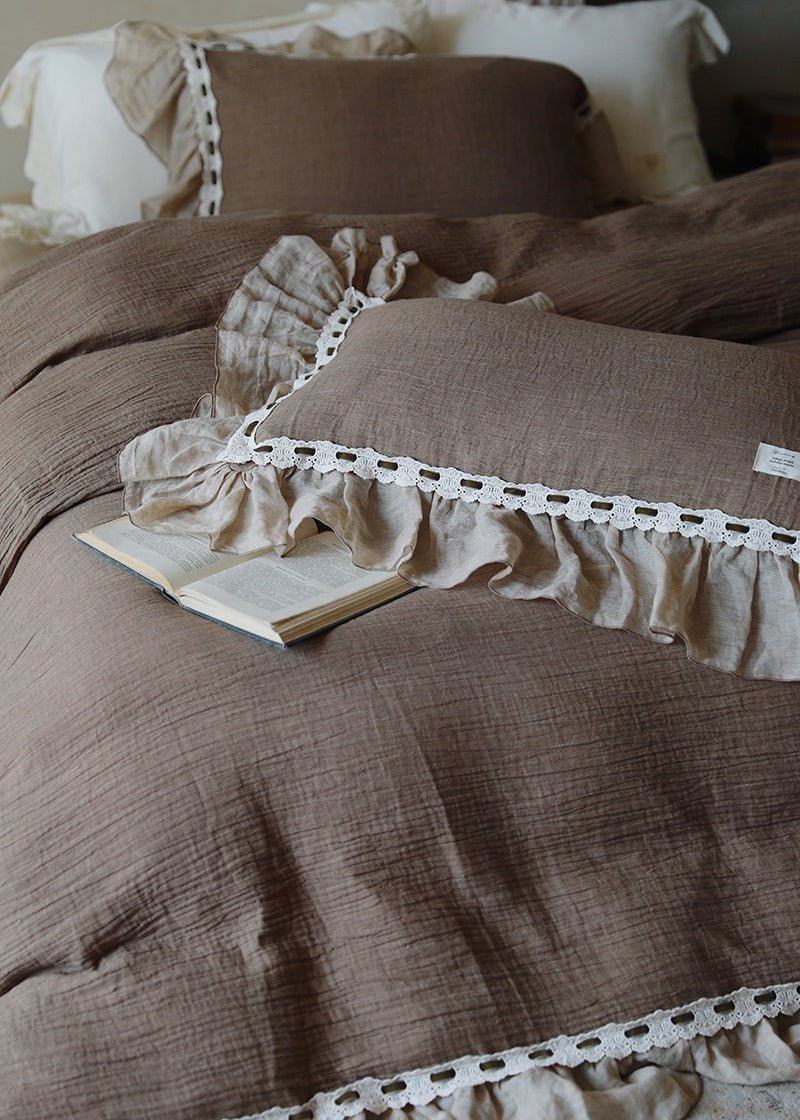Elderfield Ruffle Lace Cotton-Linen Bedding Set – folded cocoa duvet and pillows with pale lace-edged ruffles - Roomden
