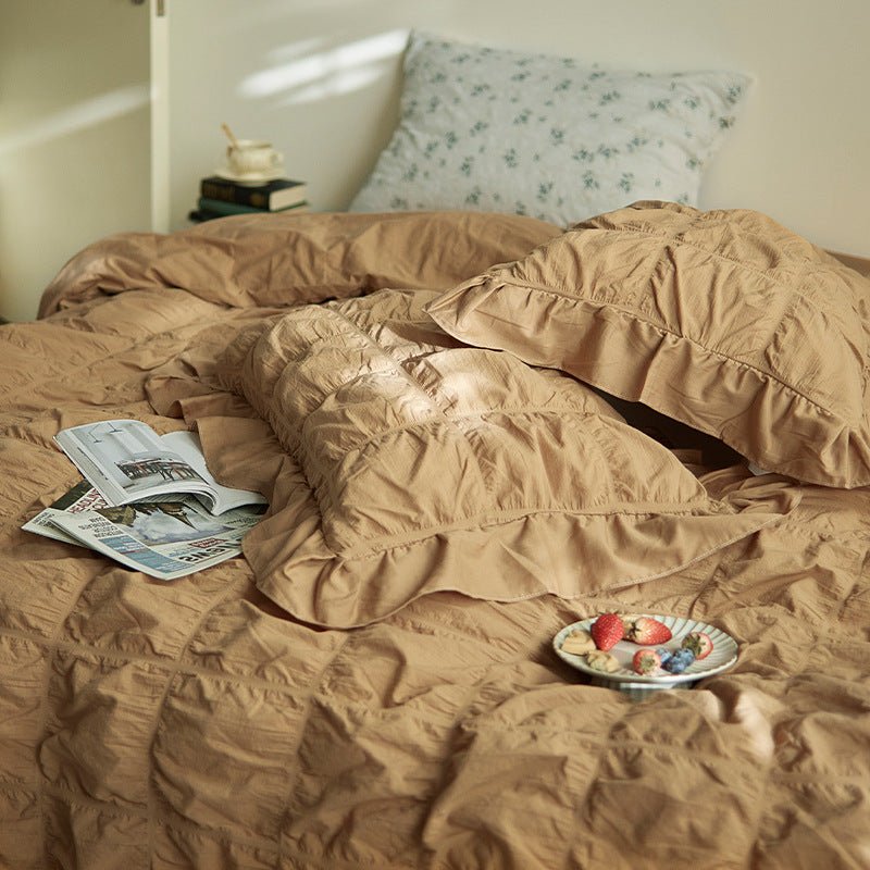 Odessa Ruffled Cotton Blend Bedding Set – close view of gathered brown fabric and matching pillows - Roomden