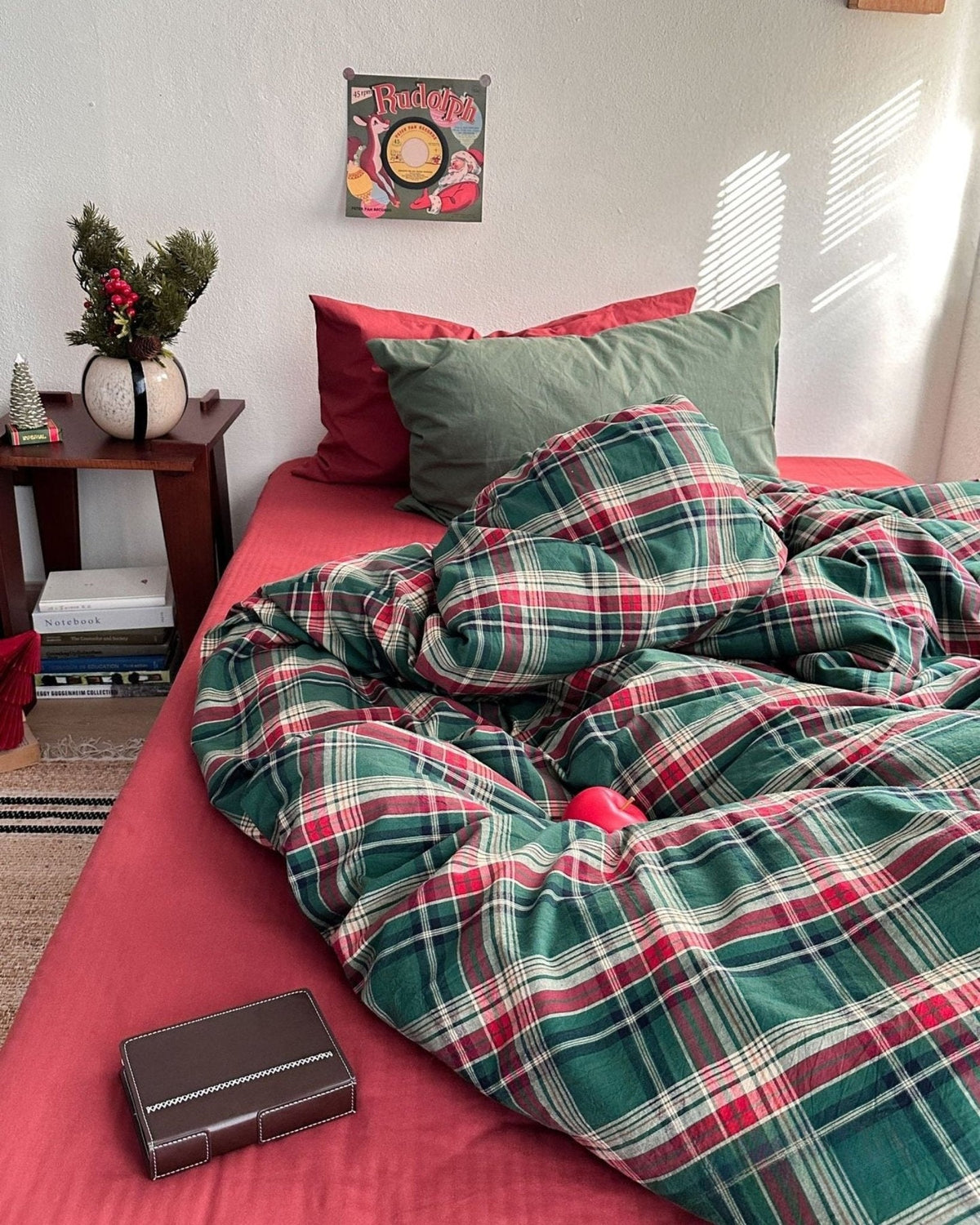 Kirkwood Plaid Cotton Bedding Set – red sheet and folded plaid duvet beside the bed - Roomden