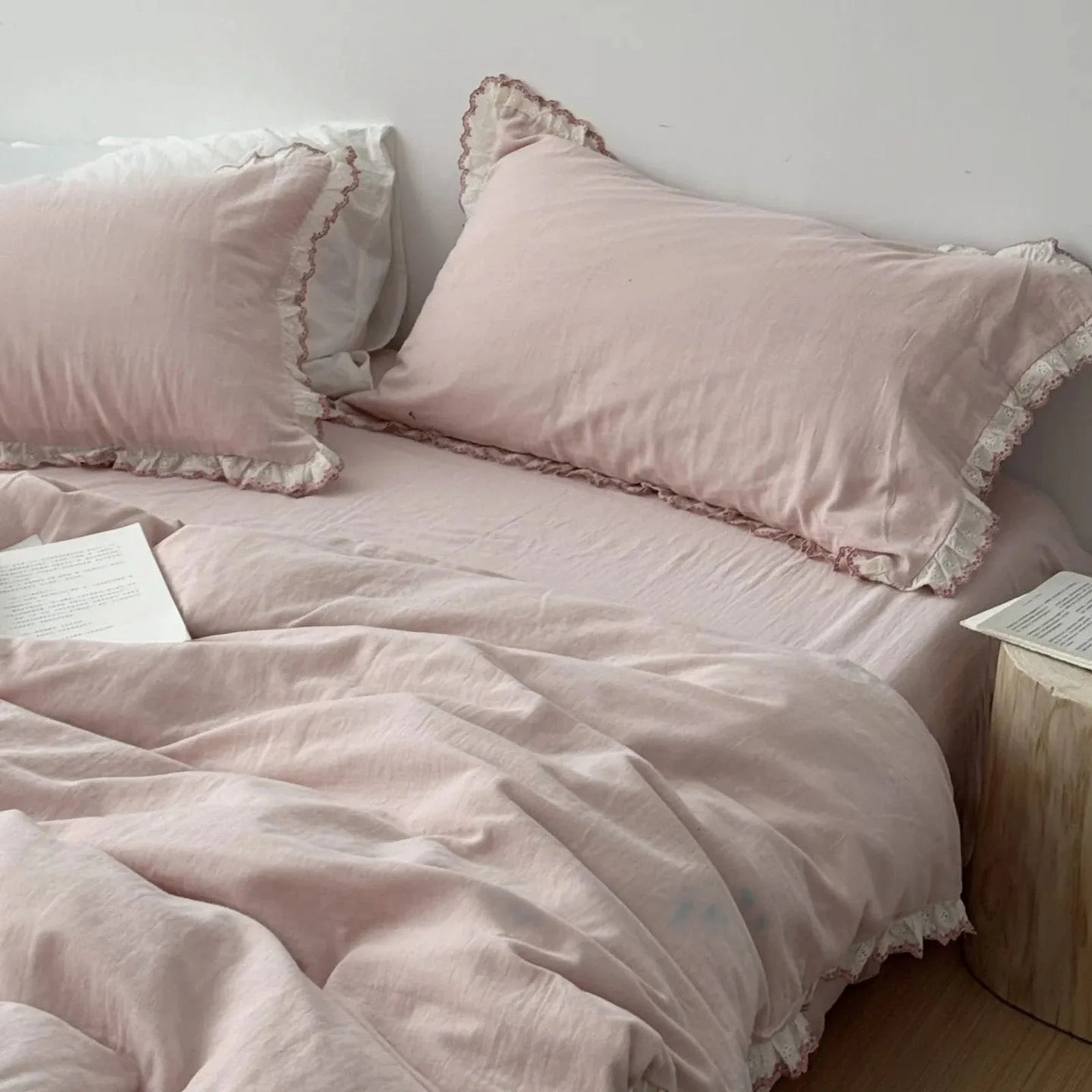 Full view of the Soft Embroidered Lace Ruffle Cotton Bedding Set in a delicate dusty rose pink.