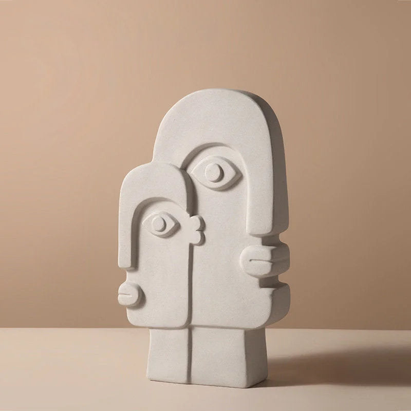 Front view of the double-face abstract ceramic vase in a sculptural design - RoomDen.