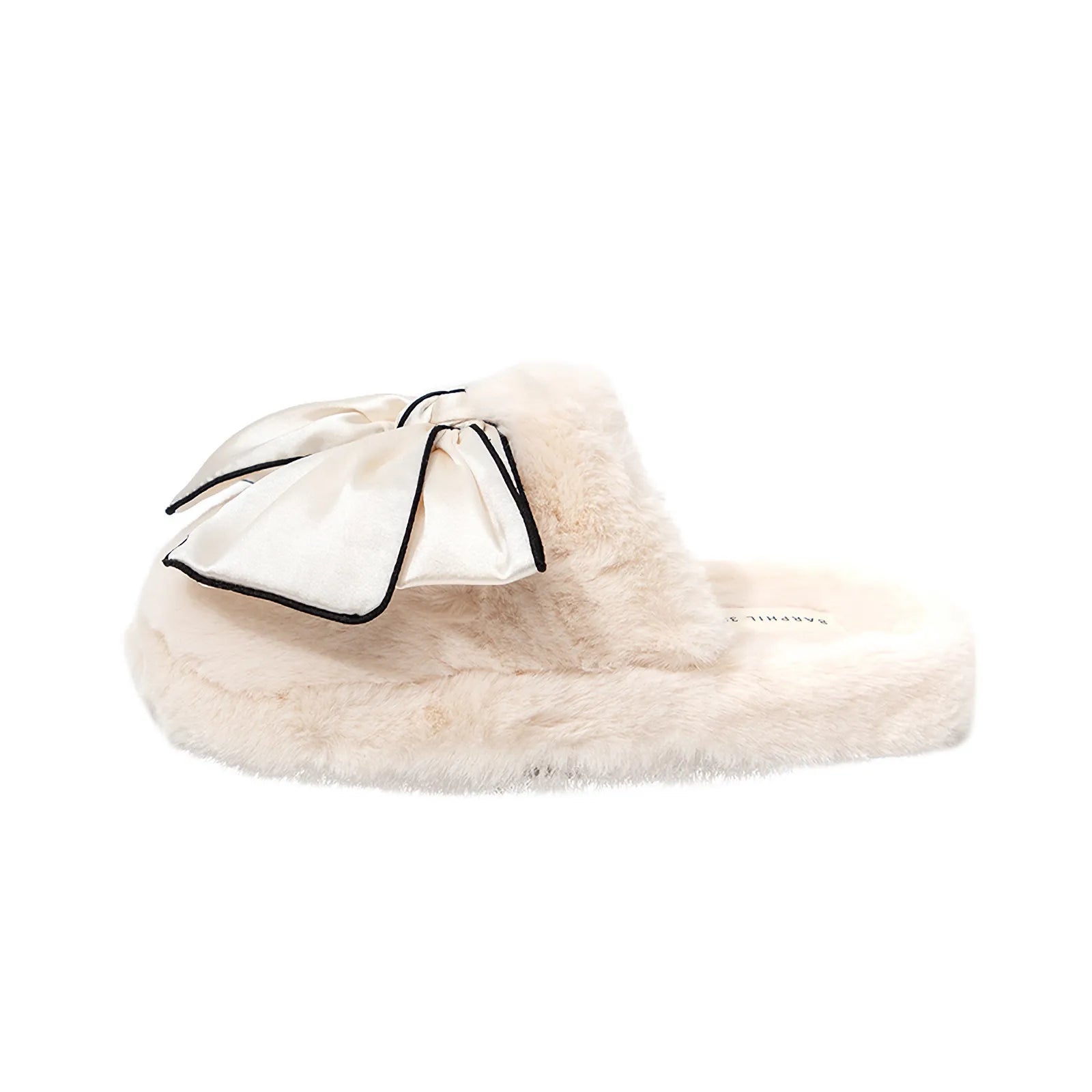 Side profile of Cream Satin Bow Slipper showing fluffy texture