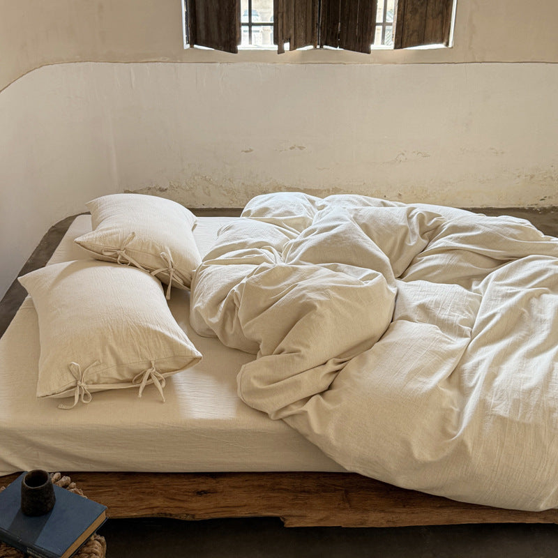 Ashfield Natural Ivory Bedding Set – Ivory duvet and pillows spread across the bed - Roomden