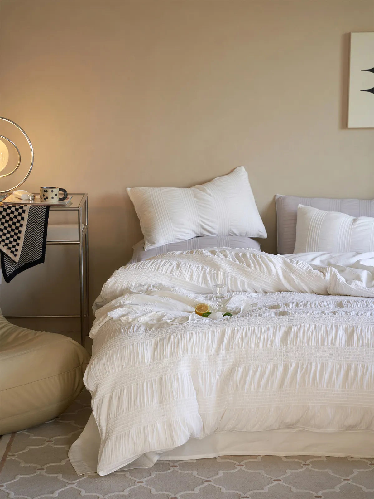 Full bedroom view featuring the Classic White pintuck bedding set. - RoomDen