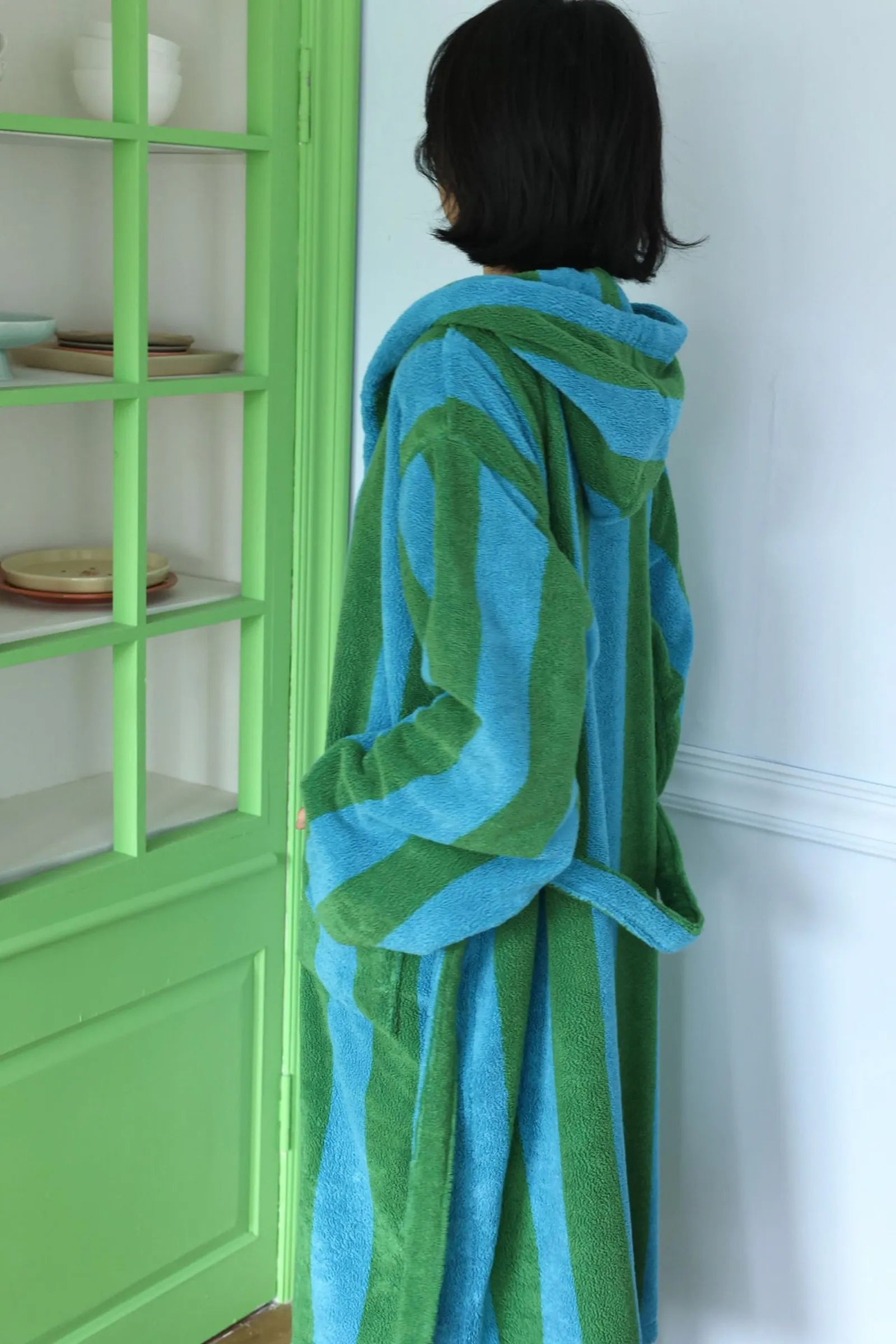Back view of the hooded robe highlighting the vertical stripe pattern and hood - RoomDen