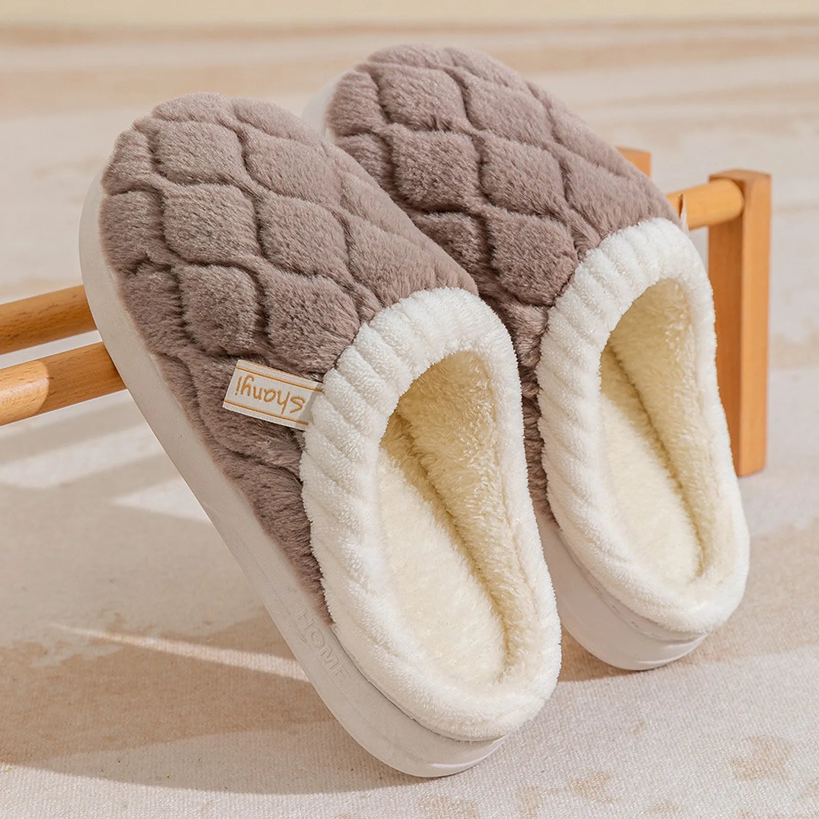 Pair of Mocha Brown textured house slippers on a display rack - RoomDen