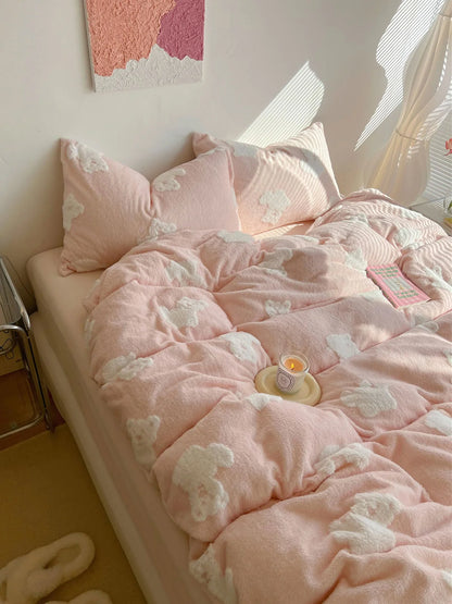 A beautifully styled bed with the blush pink teddy bear flannel fleece bedding, creating a soft and inviting atmosphere. - RoomDen