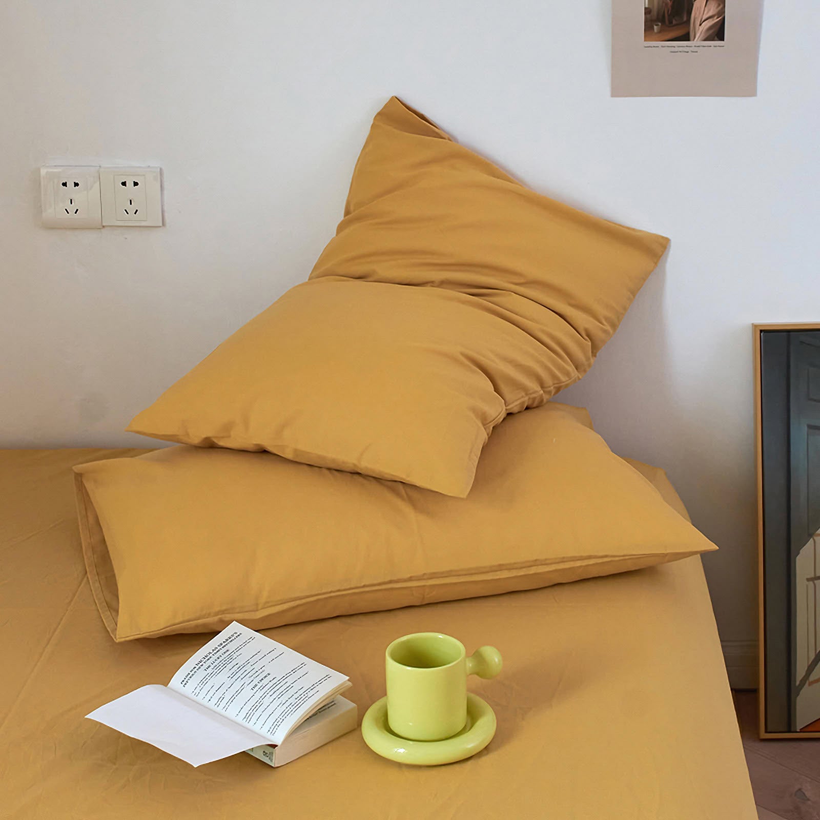 Soft washed cotton solid pillowcase in a minimalist cozy bedroom – RoomDen