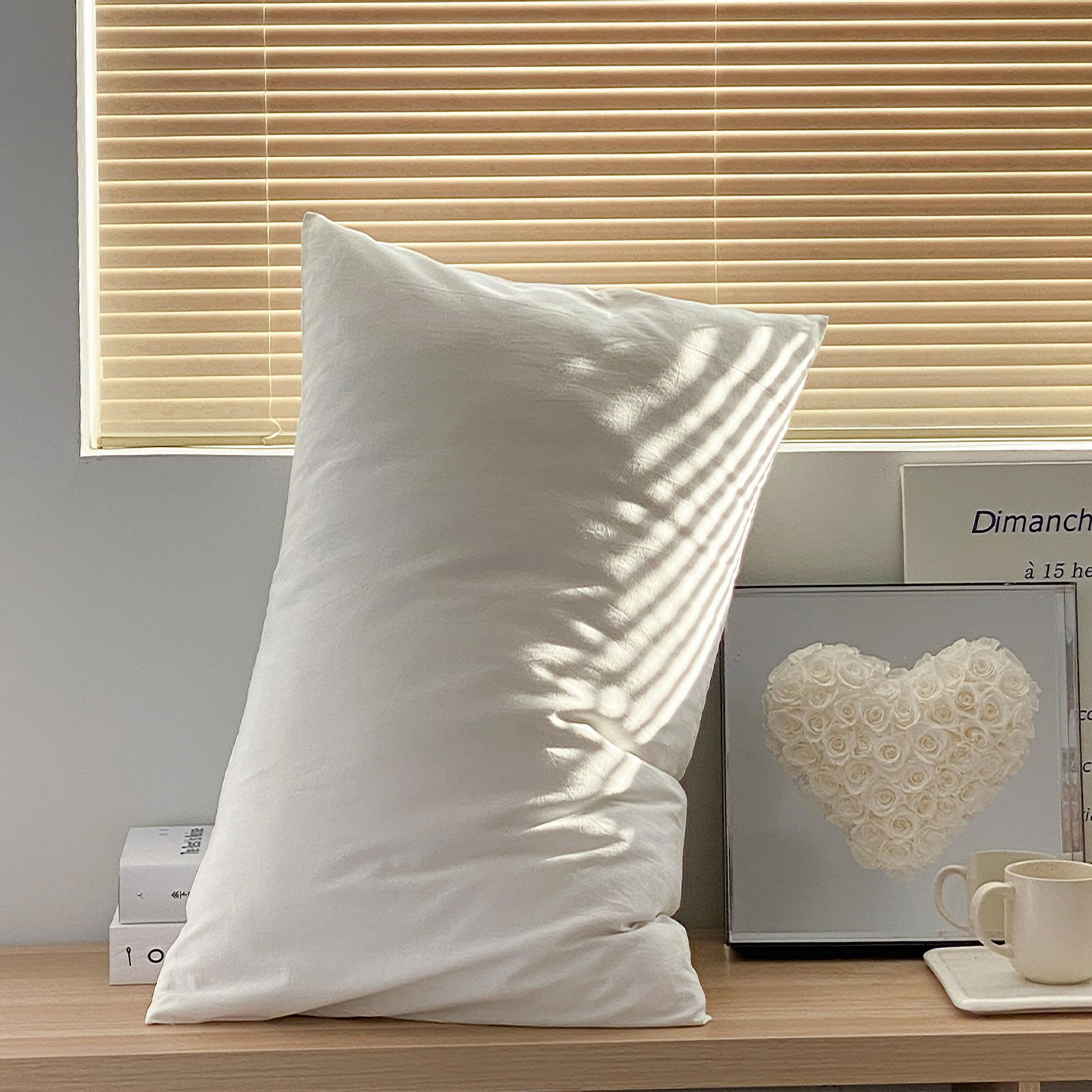 Soft washed cotton solid pillowcase in a minimalist cozy bedroom – RoomDen