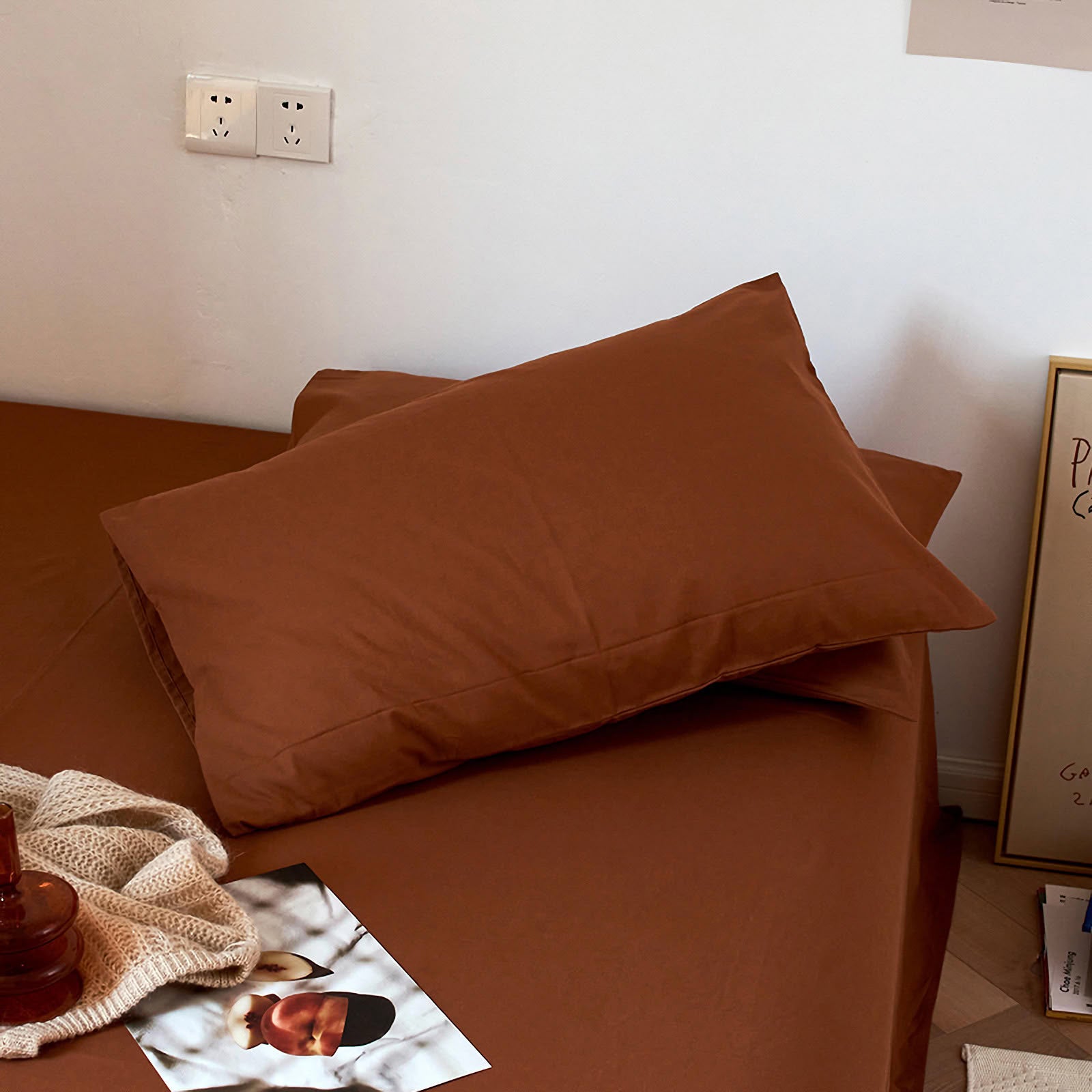 Soft washed cotton solid pillowcase in a minimalist cozy bedroom – RoomDen