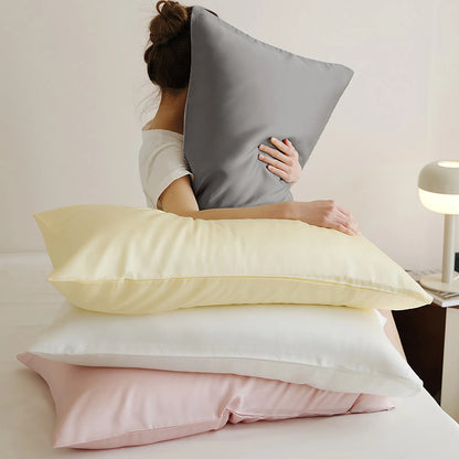Soft pastel cooling Tencel pillowcase with a smooth minimalist design - RoomDen