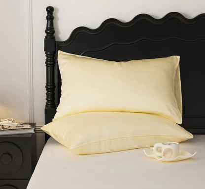 Soft pastel cooling Tencel pillowcase with a smooth minimalist design - RoomDen