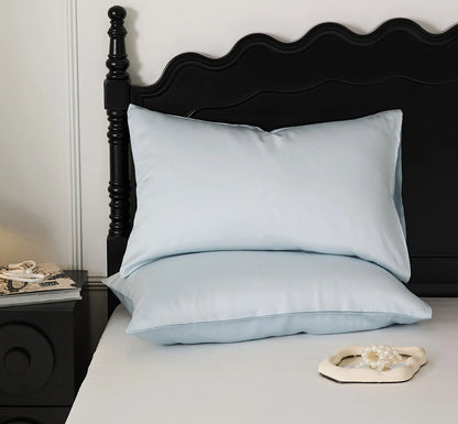 Soft pastel cooling Tencel pillowcase with a smooth minimalist design - RoomDen