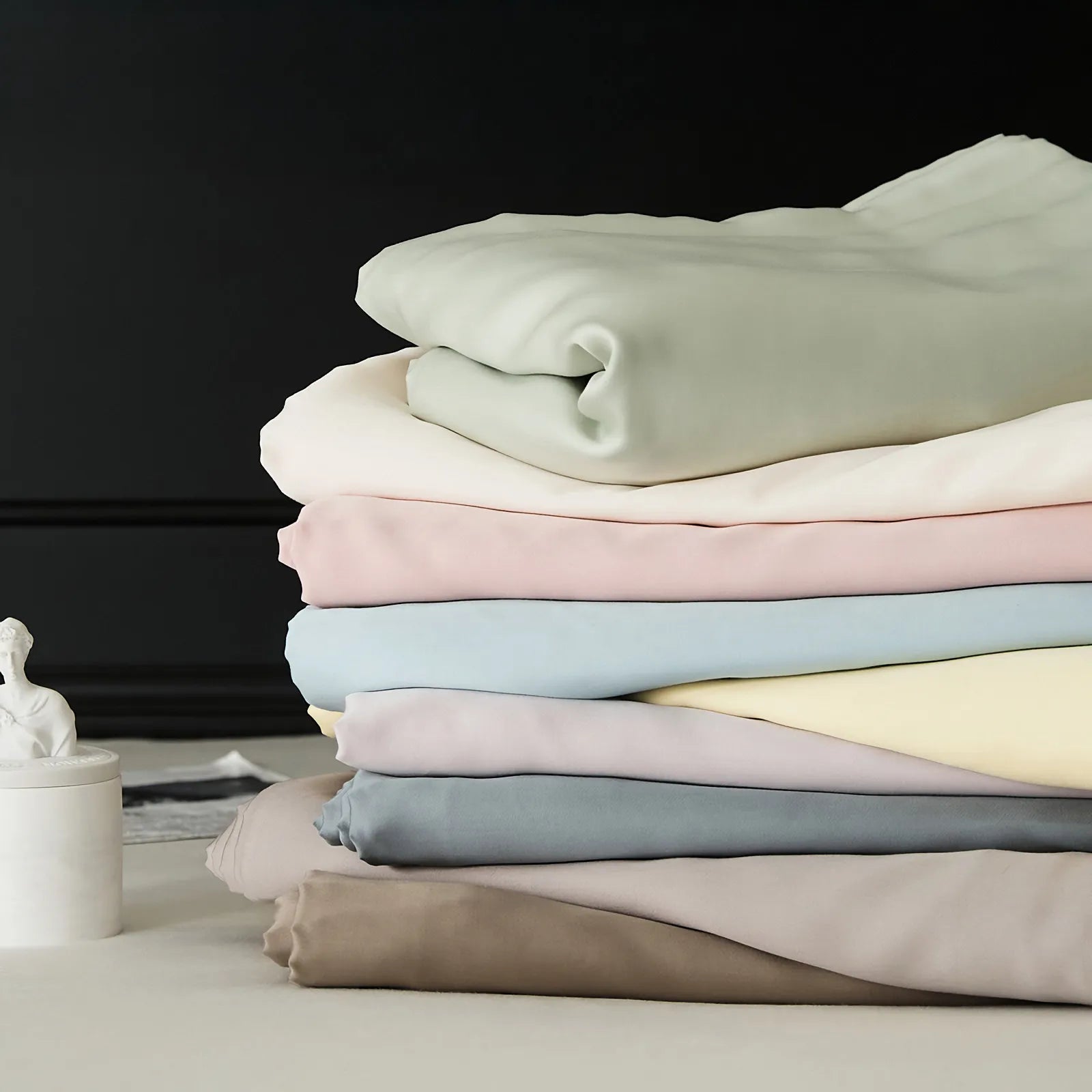 Cooling Tencel sheet set with silky smooth drape on a minimalist bed – RoomDen