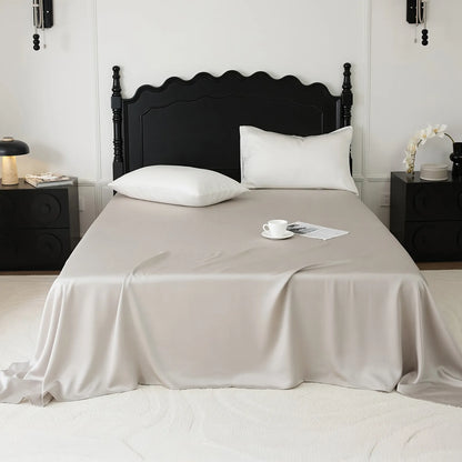 Cooling Tencel sheet set with silky smooth drape on a minimalist bed – RoomDen