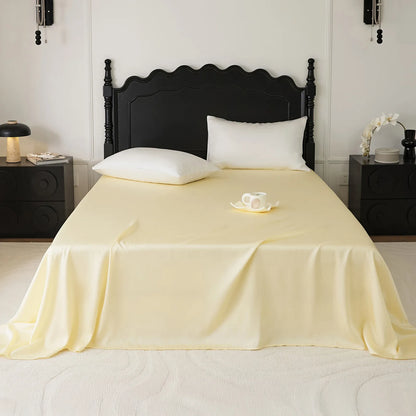 Cooling Tencel sheet set with silky smooth drape on a minimalist bed – RoomDen