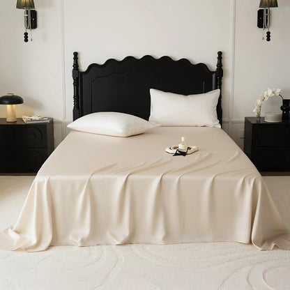 Cooling Tencel sheet set with silky smooth drape on a minimalist bed – RoomDen