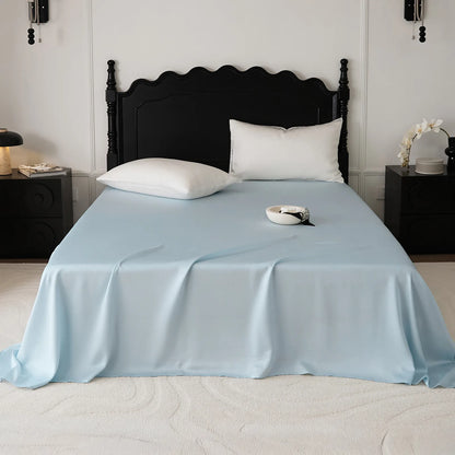 Cooling Tencel sheet set with silky smooth drape on a minimalist bed – RoomDen