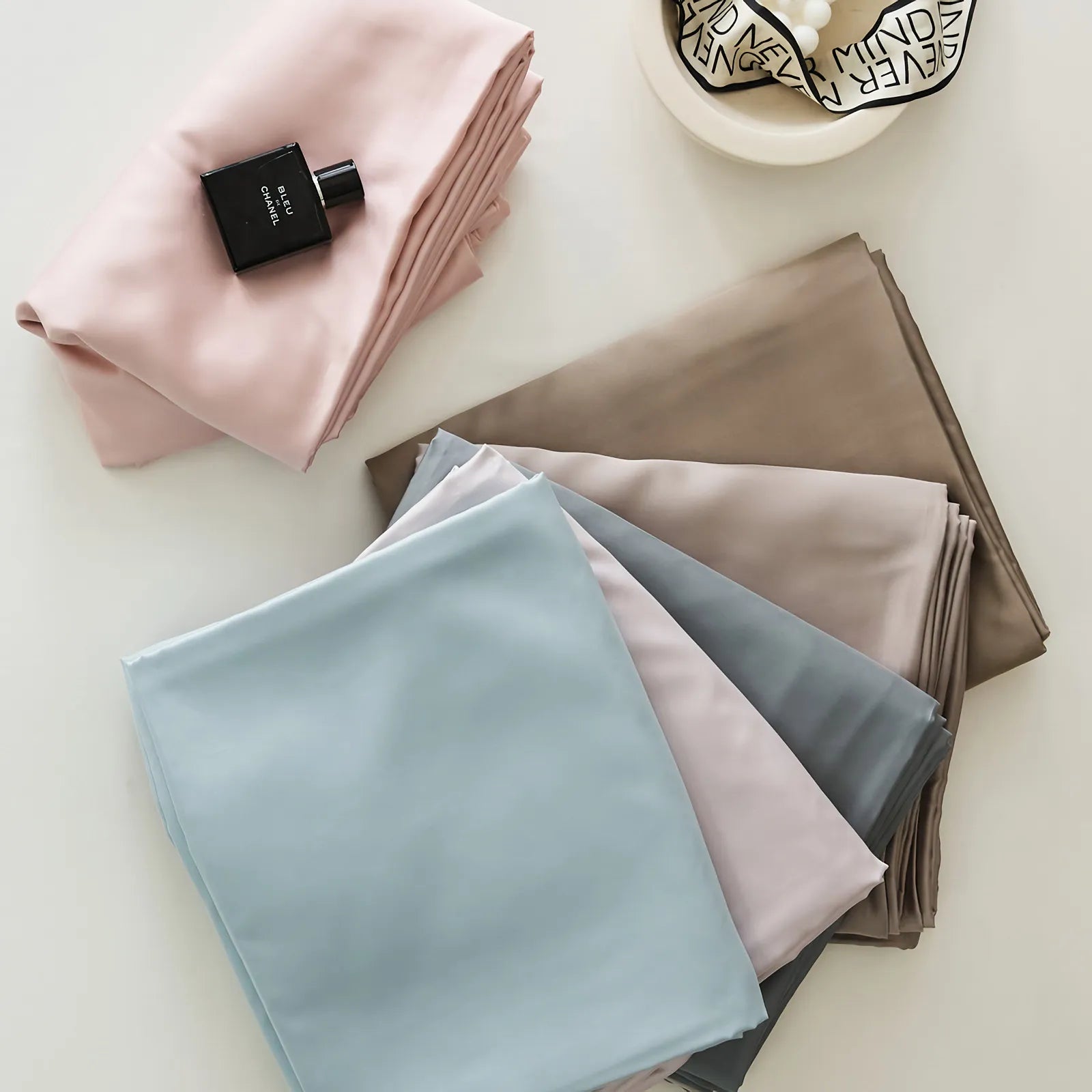 Cooling Tencel sheet set with silky smooth drape on a minimalist bed – RoomDen