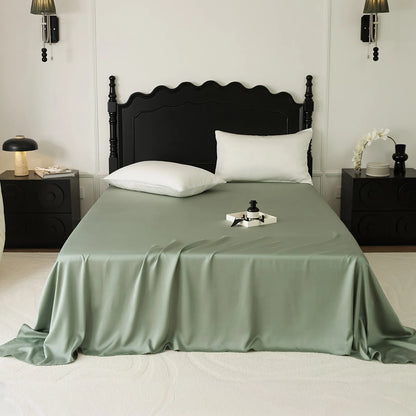 Cooling Tencel sheet set with silky smooth drape on a minimalist bed – RoomDen