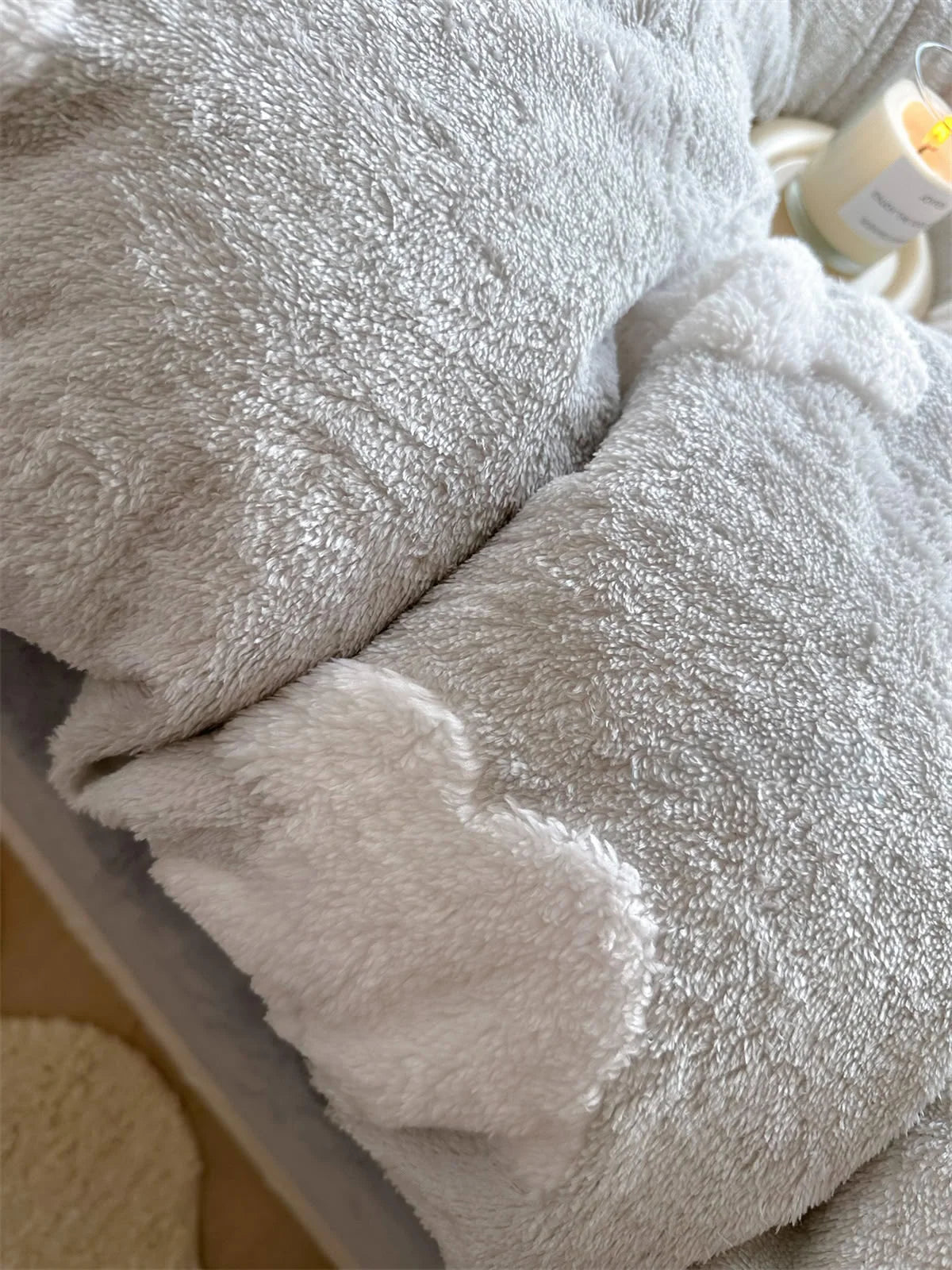 Detailed close-up of the light grey flannel fleece pillowcase, showing the material's plushness and texture. - RoomDen