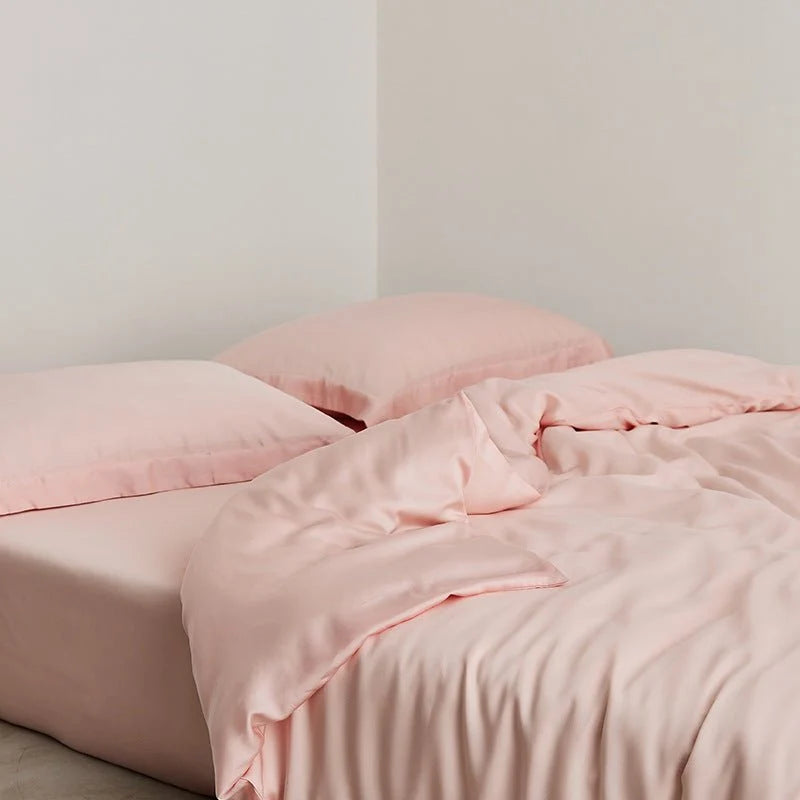 Washed lyocell bedding set – Peach Blush, folded fabric display - Roomden