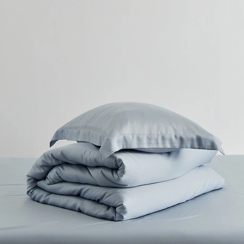 Washed lyocell bedding set – Mist Blue, folded fabric display - Roomden
