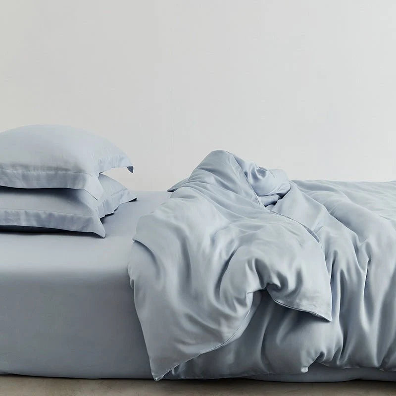 Washed lyocell bedding set – Mist Blue, angled bed arrangement - Roomden