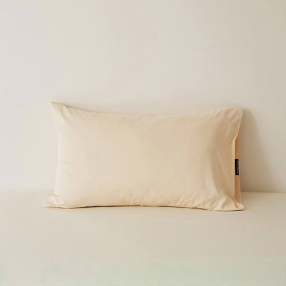 Muted solid washed cotton pillowcase in cozy minimalist style – RoomDen