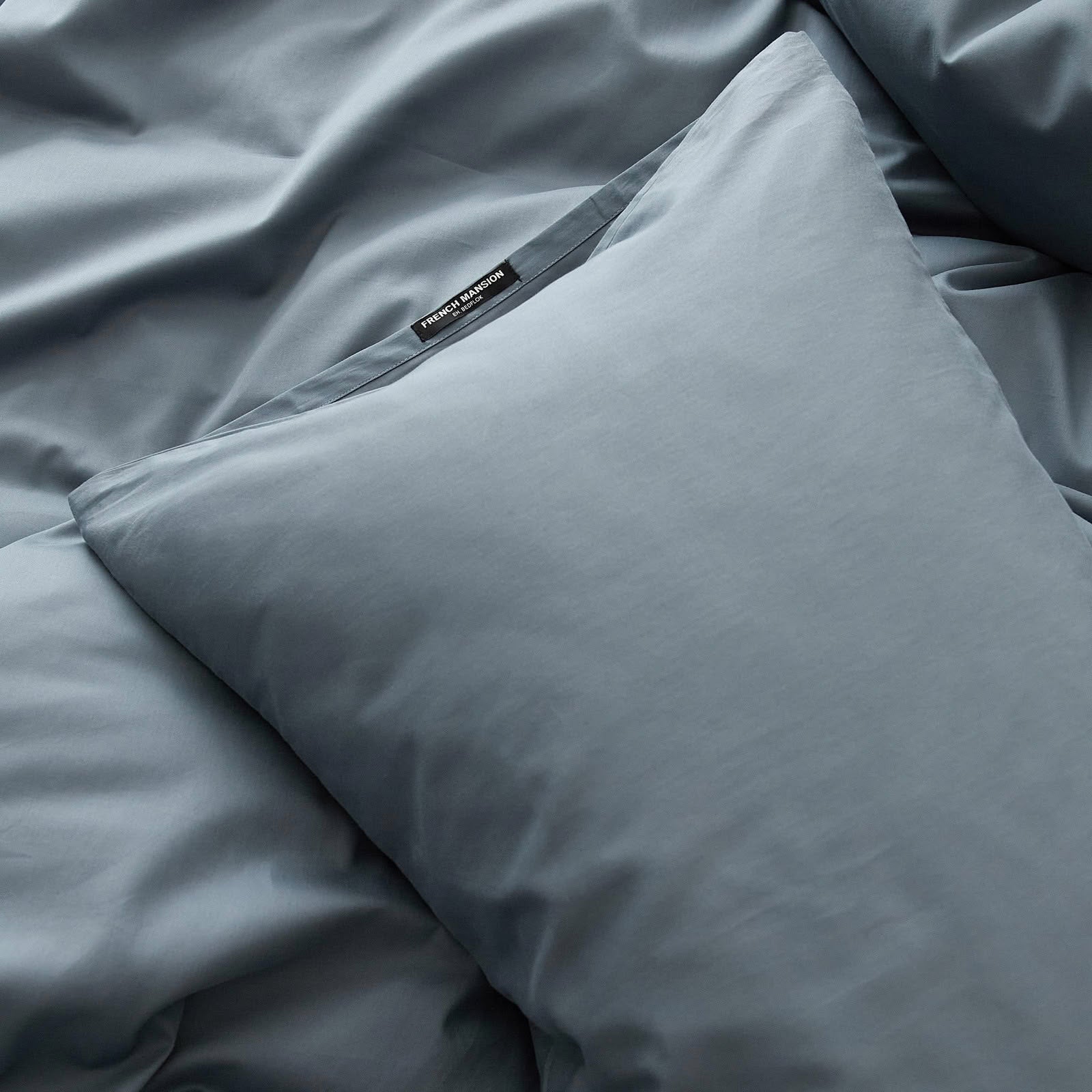 Muted solid washed cotton pillowcase in cozy minimalist style – RoomDen