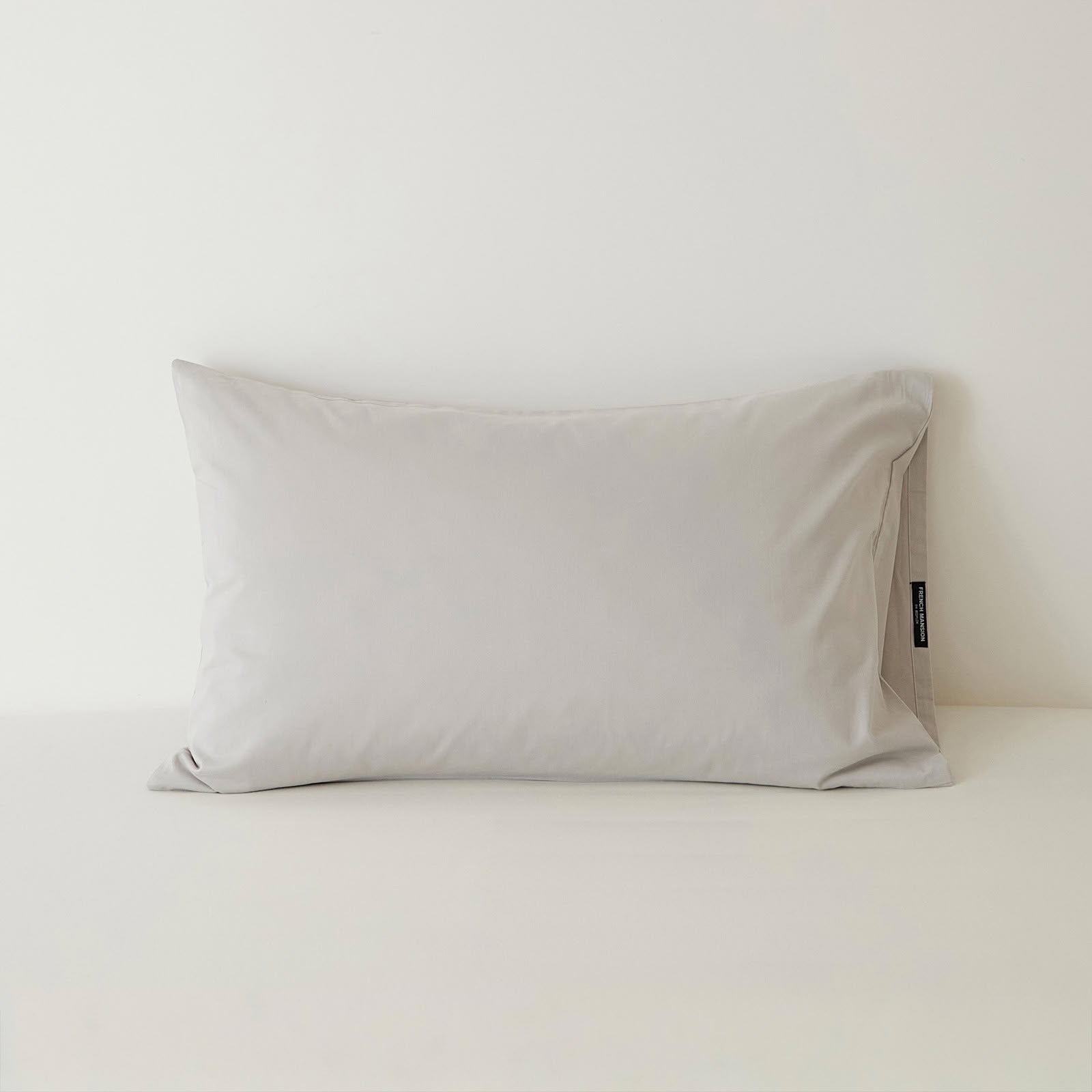 Muted solid washed cotton pillowcase in cozy minimalist style – RoomDen
