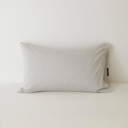 Muted solid washed cotton pillowcase in cozy minimalist style – RoomDen
