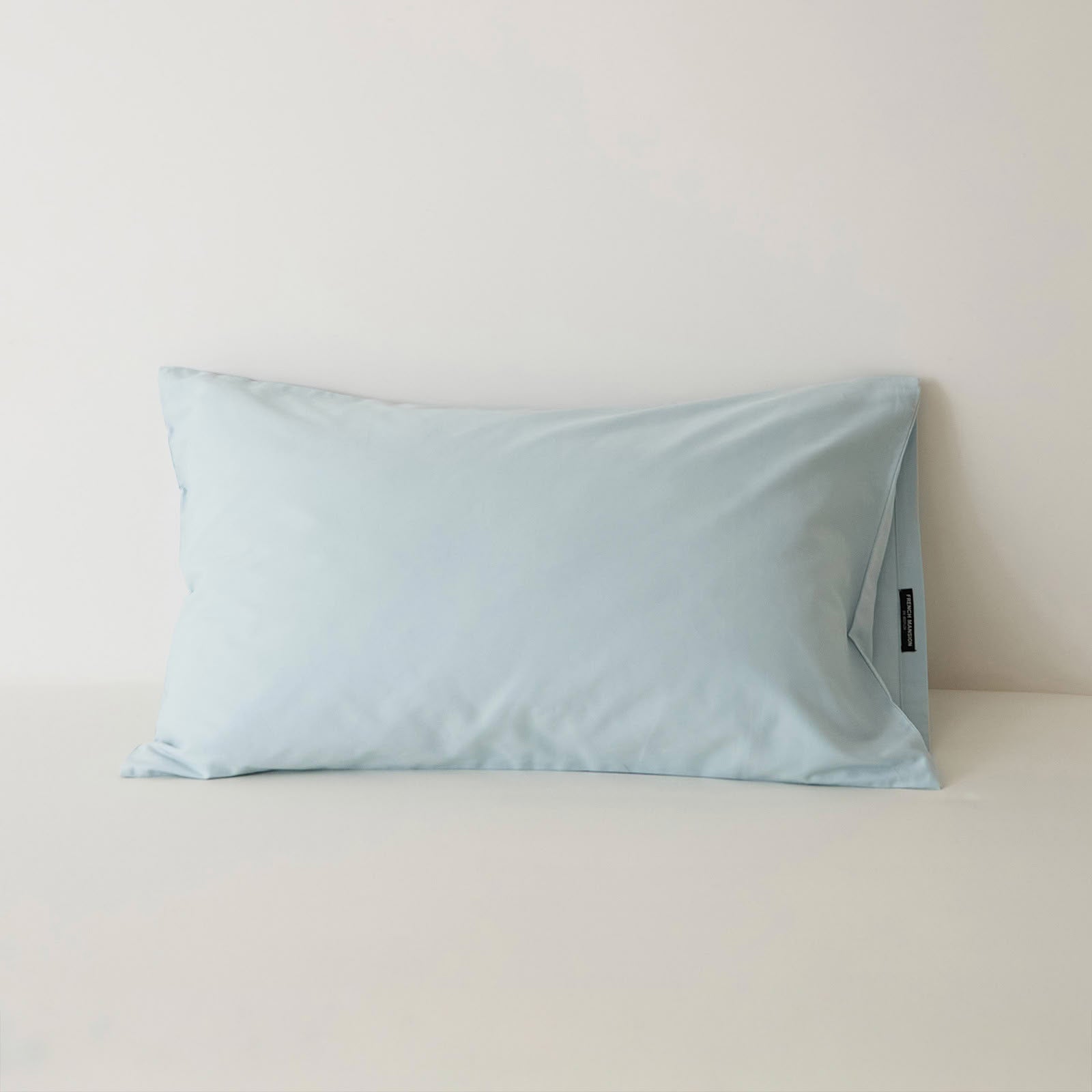 Muted solid washed cotton pillowcase in cozy minimalist style – RoomDen