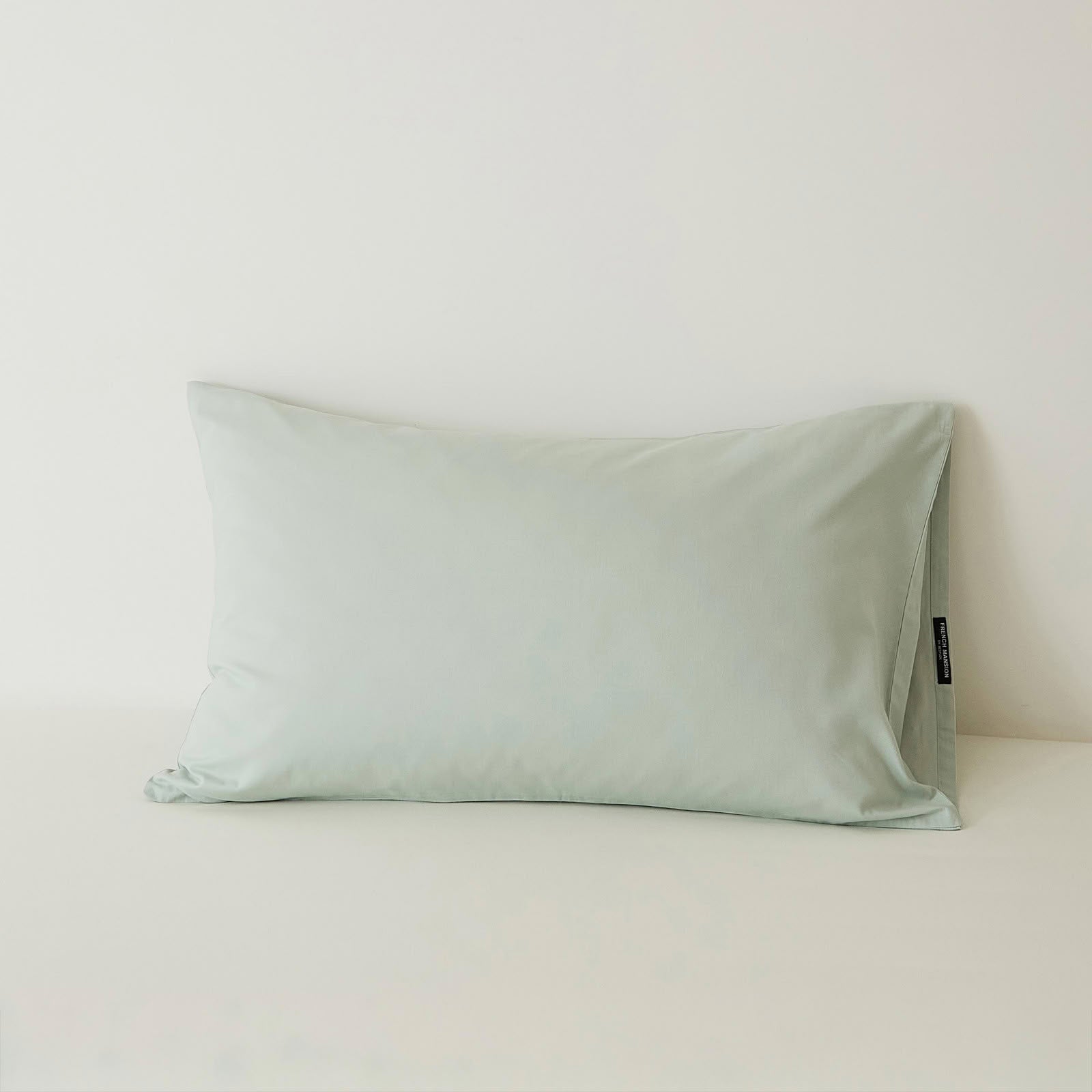 Muted solid washed cotton pillowcase in cozy minimalist style – RoomDen