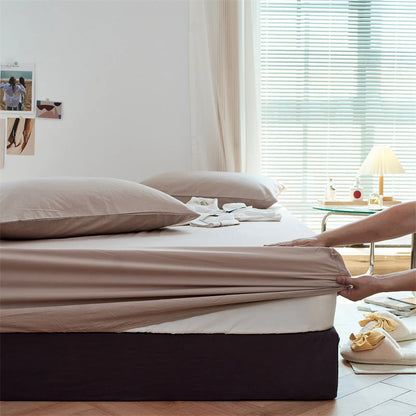 Solid washed cotton fitted sheet set in a minimalist bedroom – RoomDen