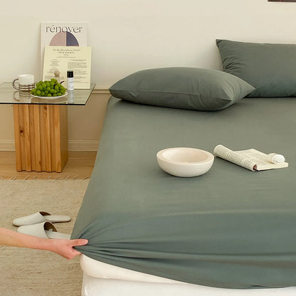 Solid washed cotton fitted sheet set in a minimalist bedroom – RoomDen