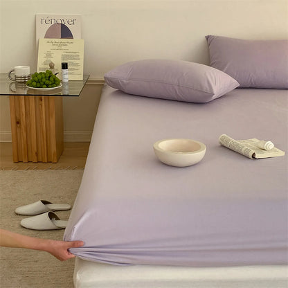 Solid washed cotton fitted sheet set in a minimalist bedroom – RoomDen