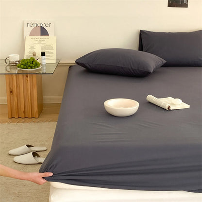 Solid washed cotton fitted sheet set in a minimalist bedroom – RoomDen