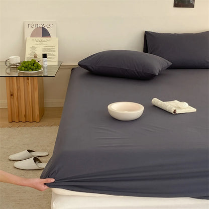 Solid washed cotton fitted sheet set in a minimalist bedroom – RoomDen