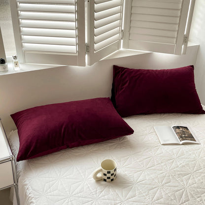 Soft flannel fleece pillowcase in a cozy minimalist bedroom setting – RoomDen