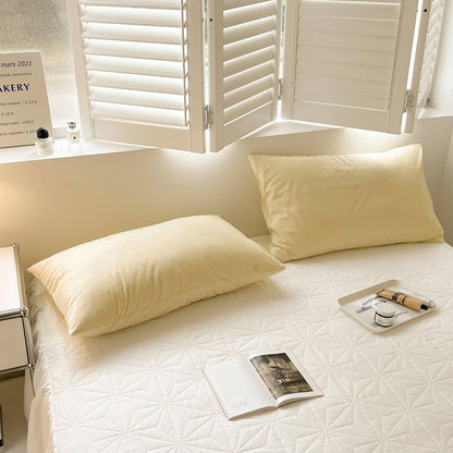 Soft flannel fleece pillowcase in a cozy minimalist bedroom setting – RoomDen